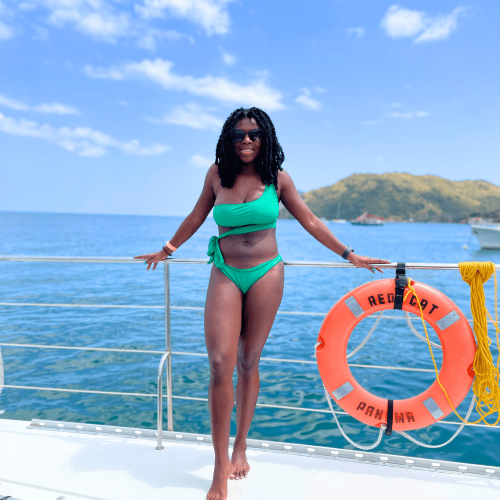 Girl in green bikini on boat